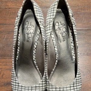 White and black heels